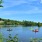 a group of people in boats on a lake