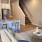 a living room with a bar and a couch